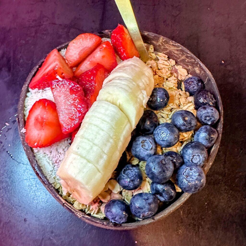 A delicious bowl of oats, strawberries, bananas, and blueberries from Birdie's near Hattiesburg, Mississippi. 