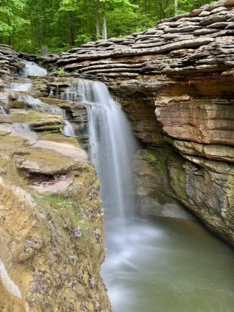 A waterfall at Lost Cave Canyon and Nature Trail at Top of the Rock, Missouri