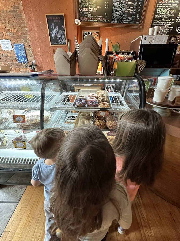 Kids looking at donuts in Mudhouse Coffee, Springfield, Missouri