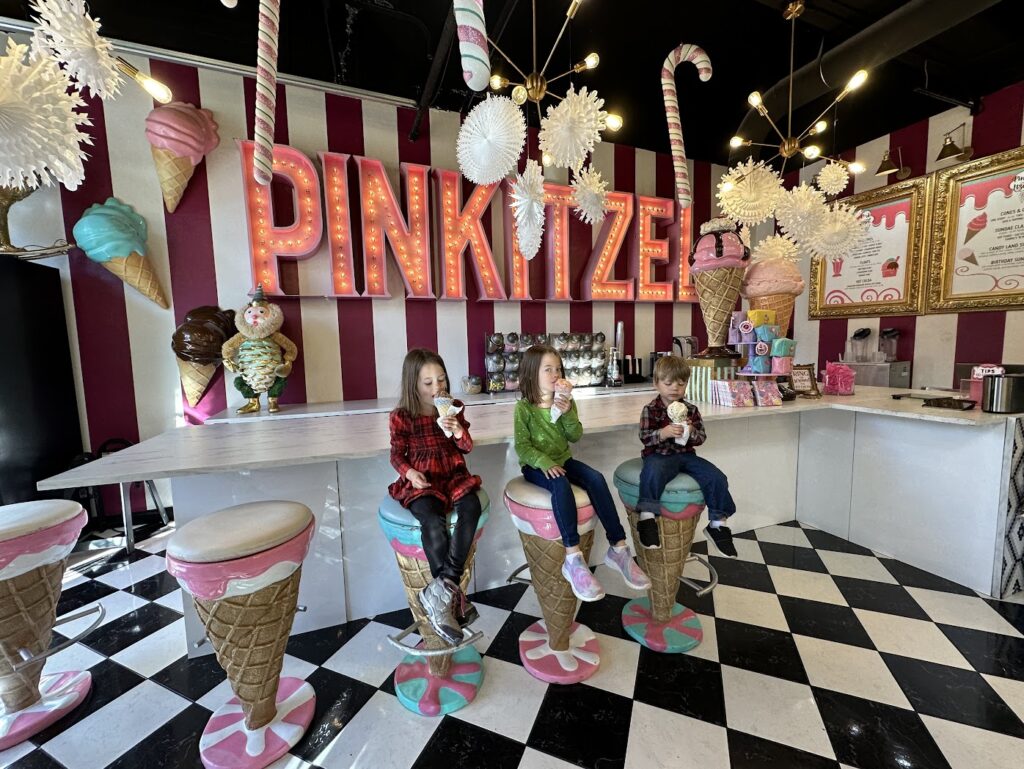 three kids eating ice cream at Pinkitzel in Oklahoma City, road trips from Kansas City