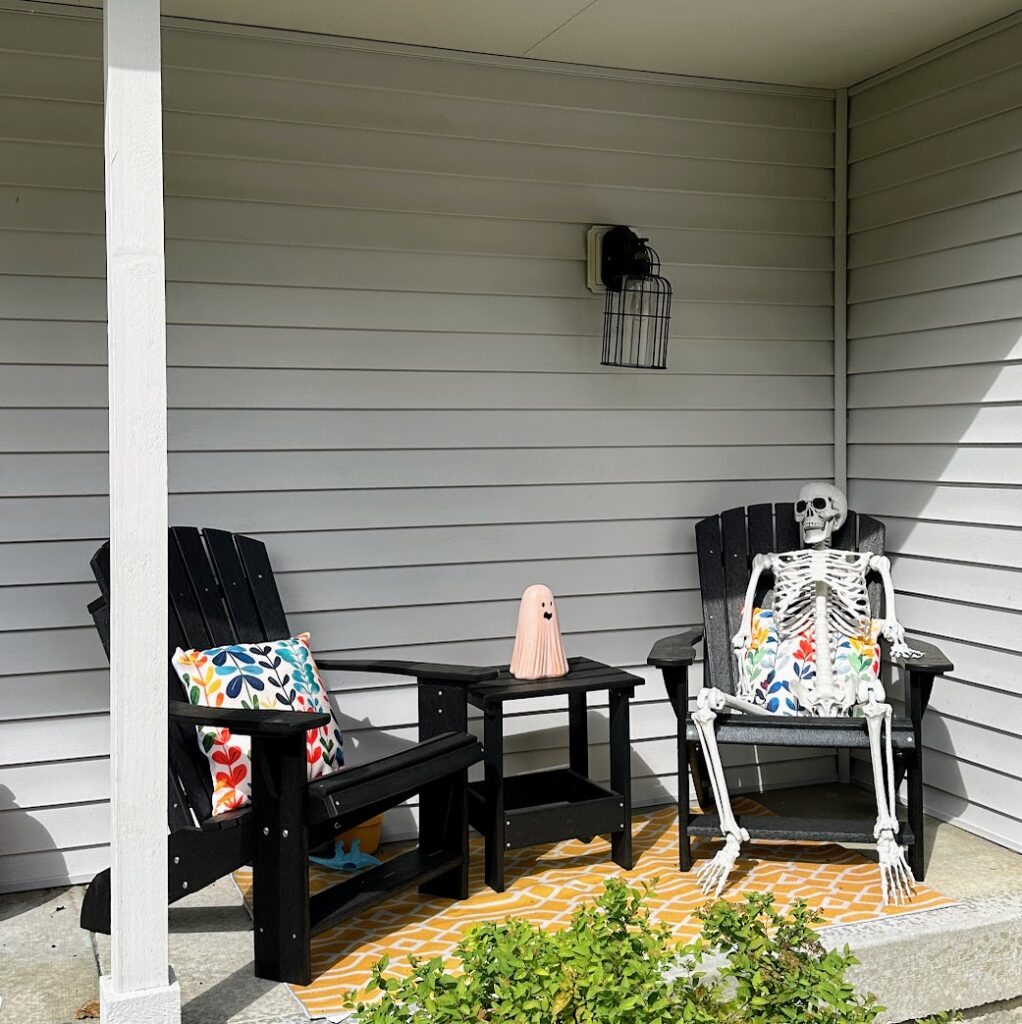 front porch with polywood furniture from Kansas City decorated for Halloween