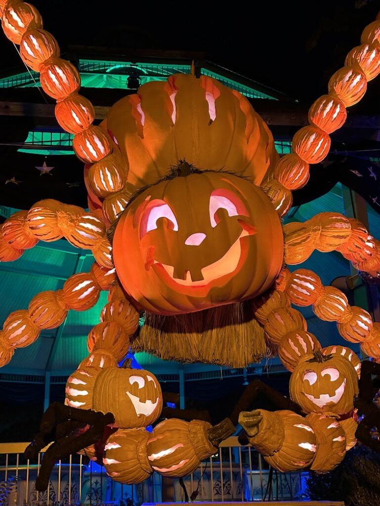 A giant smiling jack-o-lantern spider at Silver Dollar City, City of Pumpkins, Branson, Midwest Fall Trips 