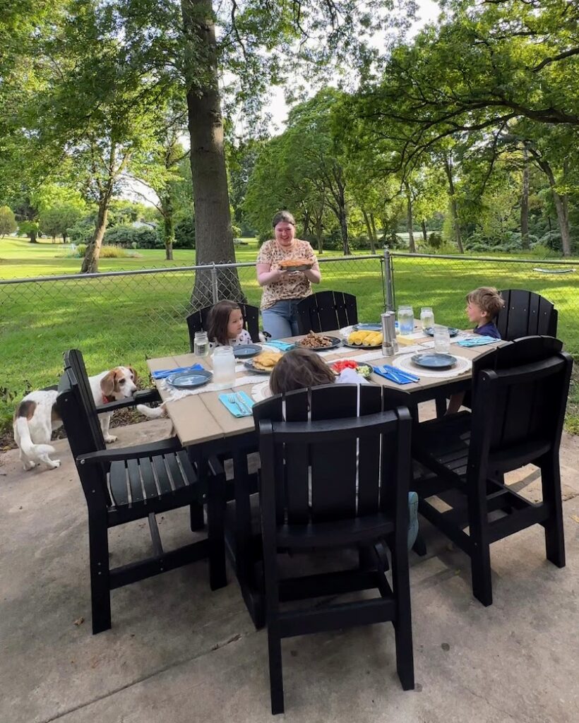 a family eating at their outdoor table in Kansas City