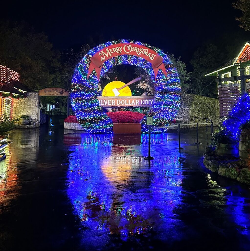 A giant wreath that says Merry Christmas at Silver Dollar City at Christmas